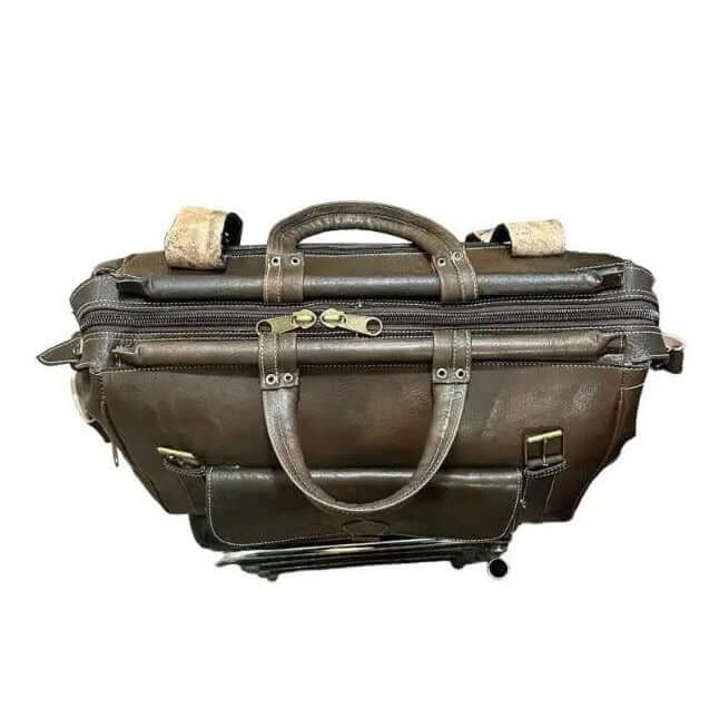 Bolso baúl gira mediano, hecho con piel natural - Look Todo Piel