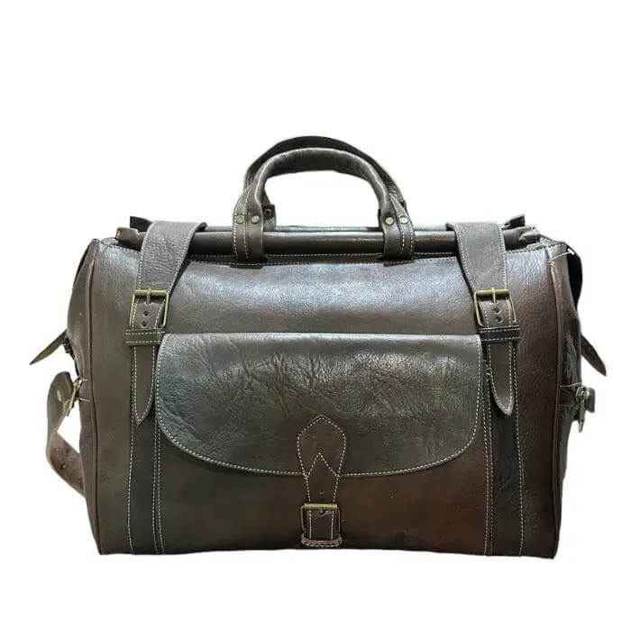 Bolso baúl gira mediano, hecho con piel natural