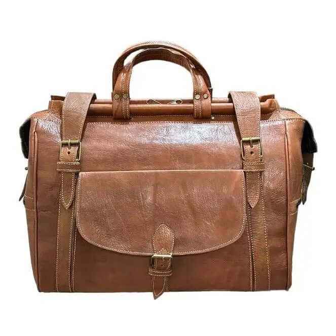 Bolso baúl gira mediano, hecho con piel natural