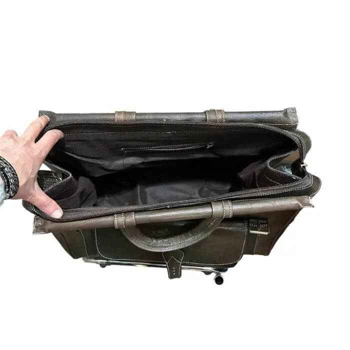Bolso baúl gira mediano, hecho con piel natural