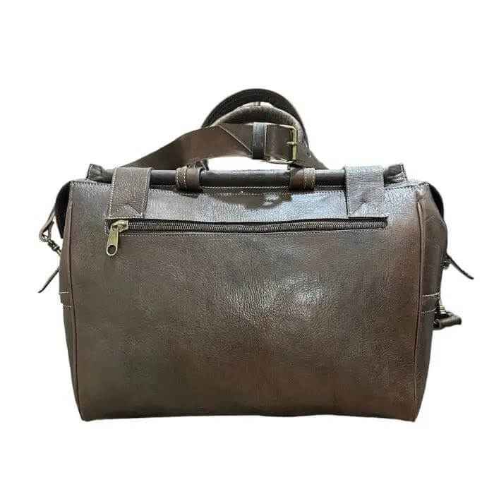 Bolso baúl gira mediano, hecho con piel natural
