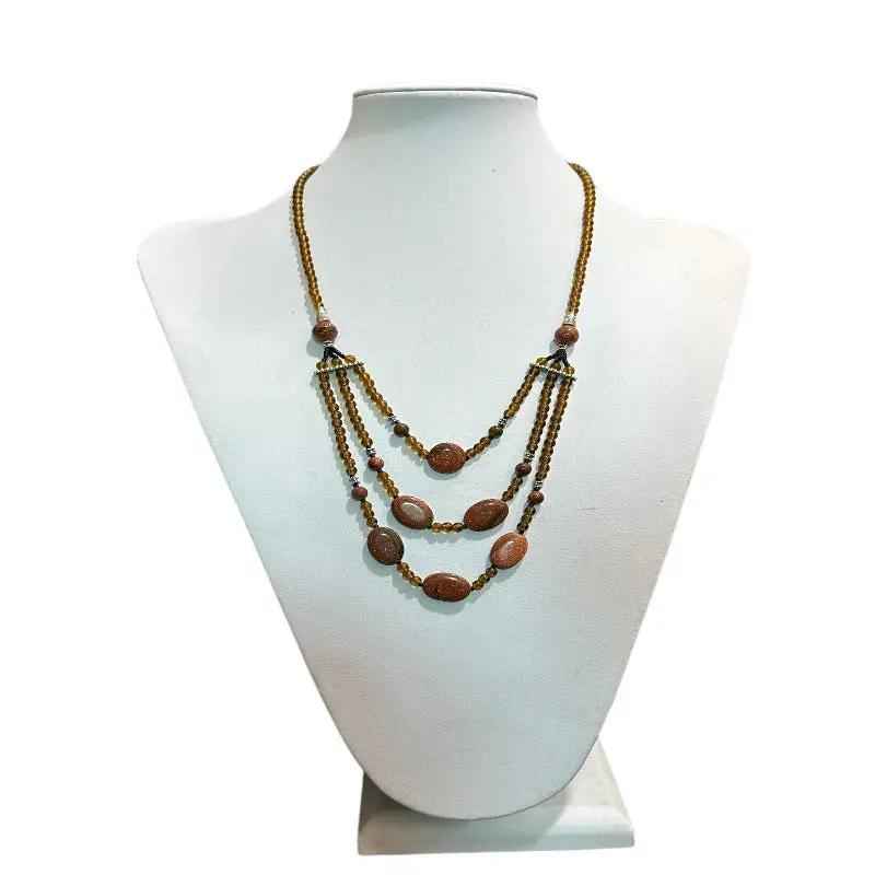 Colgante artesanal  hecho con piedra del sol para mujer