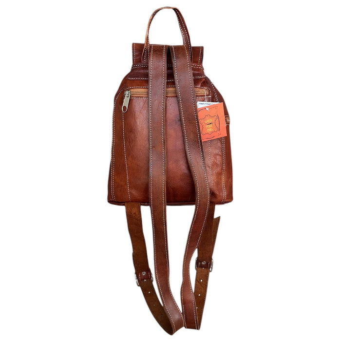 Mochila Sol con solapa artesanal de piel natural. - Look Todo Piel