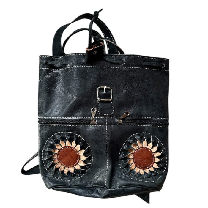 Mochila Sol con solapa artesanal de piel natural. - Look Todo Piel