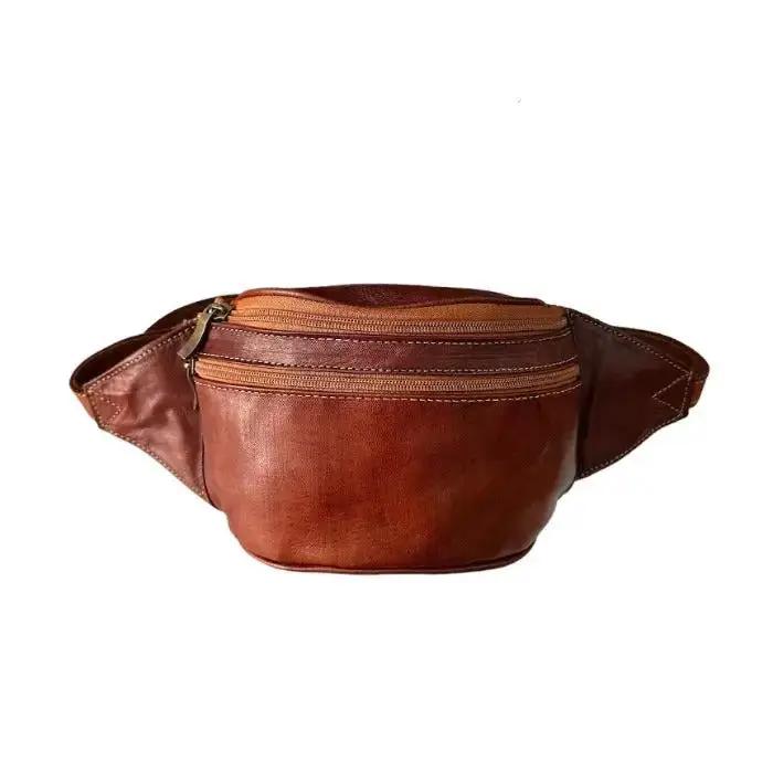 Riñonera artesanal de piel natural. Estilo: unisex