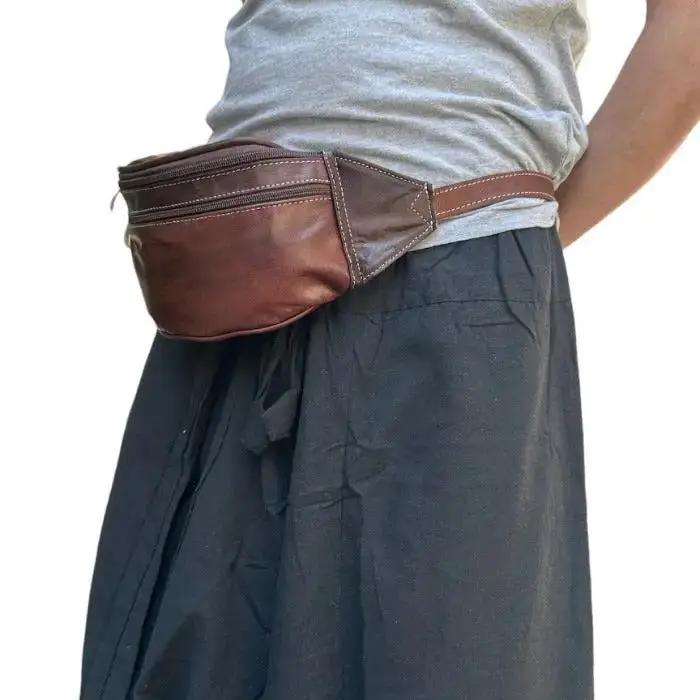 Riñonera artesanal de piel natural. Estilo: unisex - Look Todo Piel